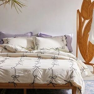 Urban outfitters Lacey ivory cream and black bow duvet and sham set